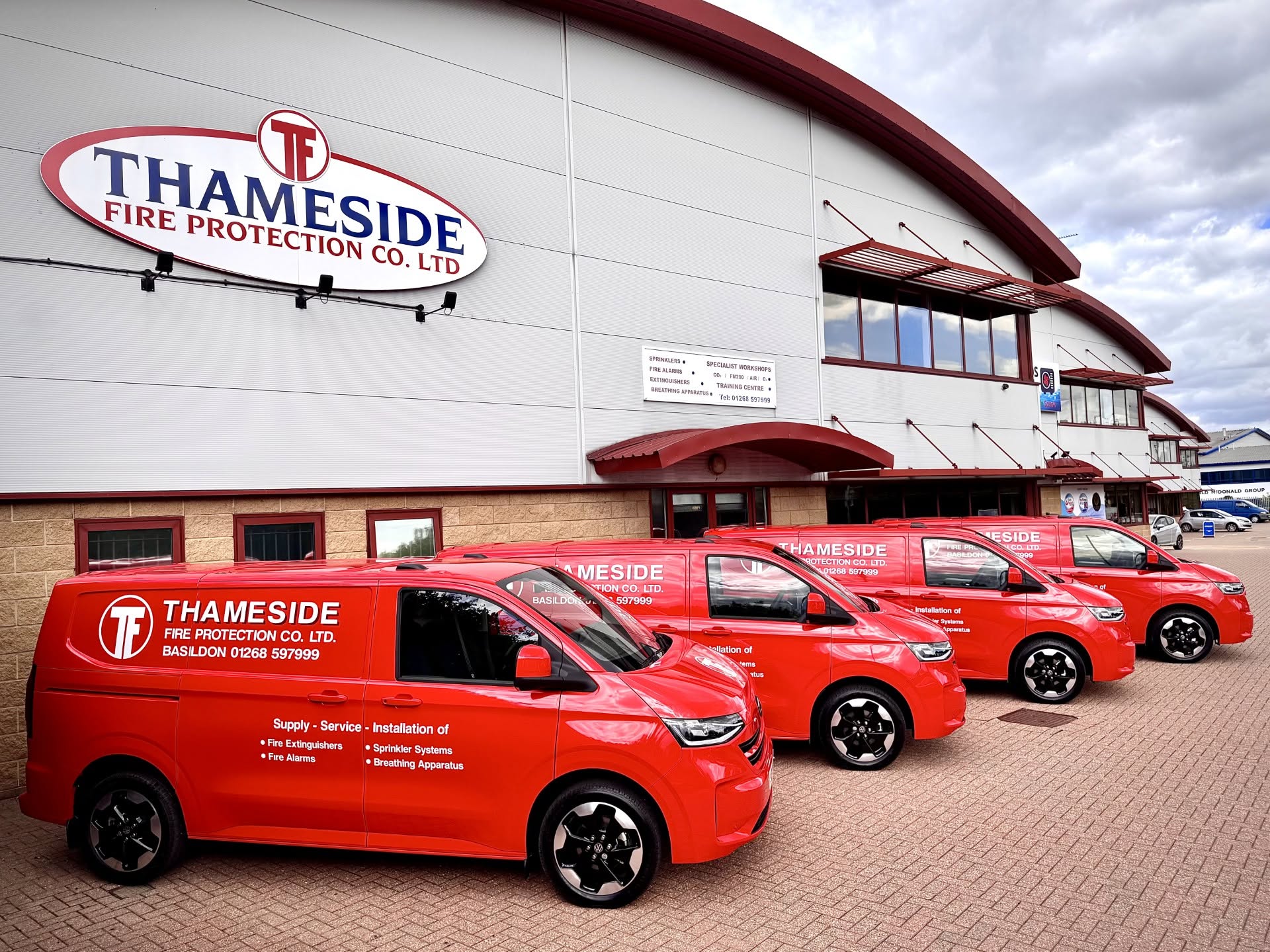 New Thameside Fire Protection fleet vans featuring company branding by Abbott Signs.
